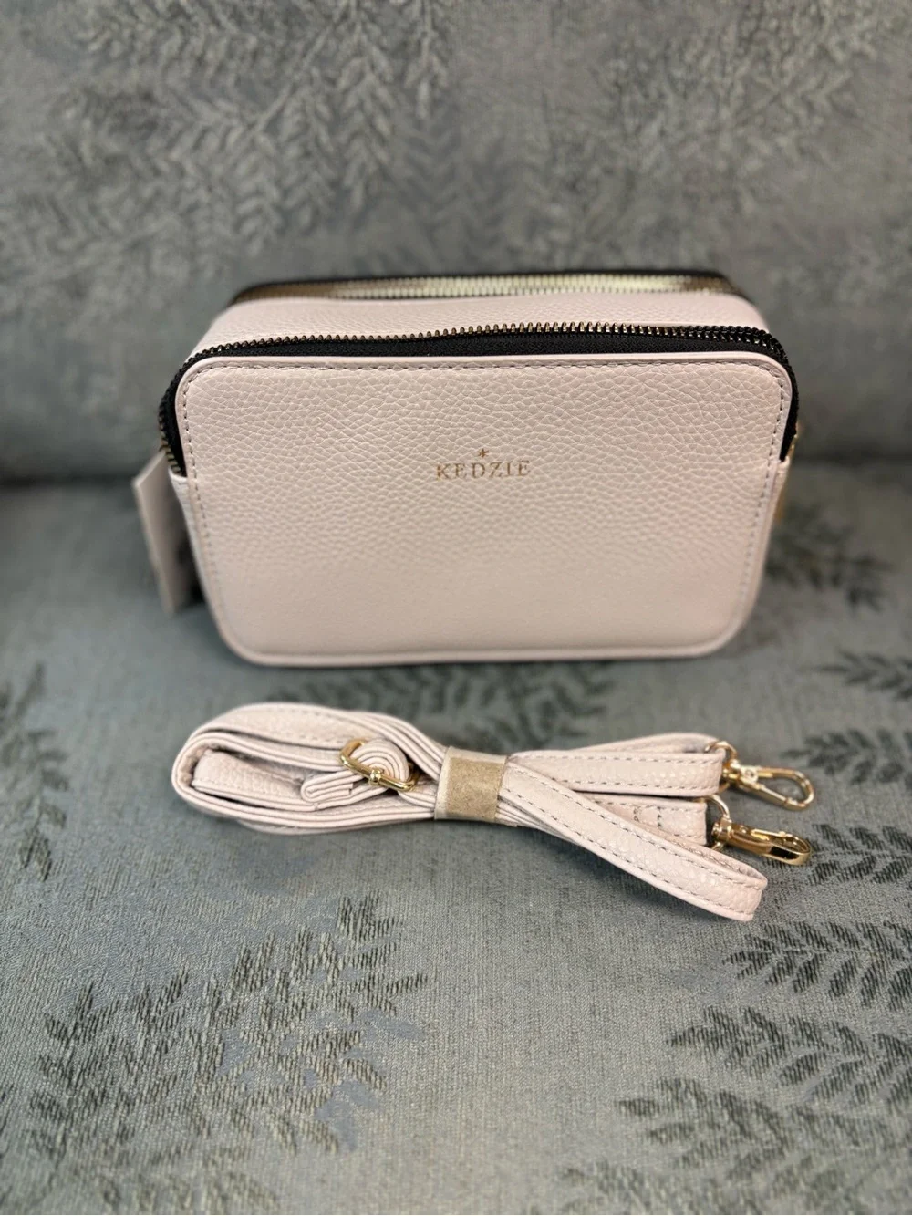 Kedzie Light Blush Pebbled Vegan Leather Crossbody with Gold Logo